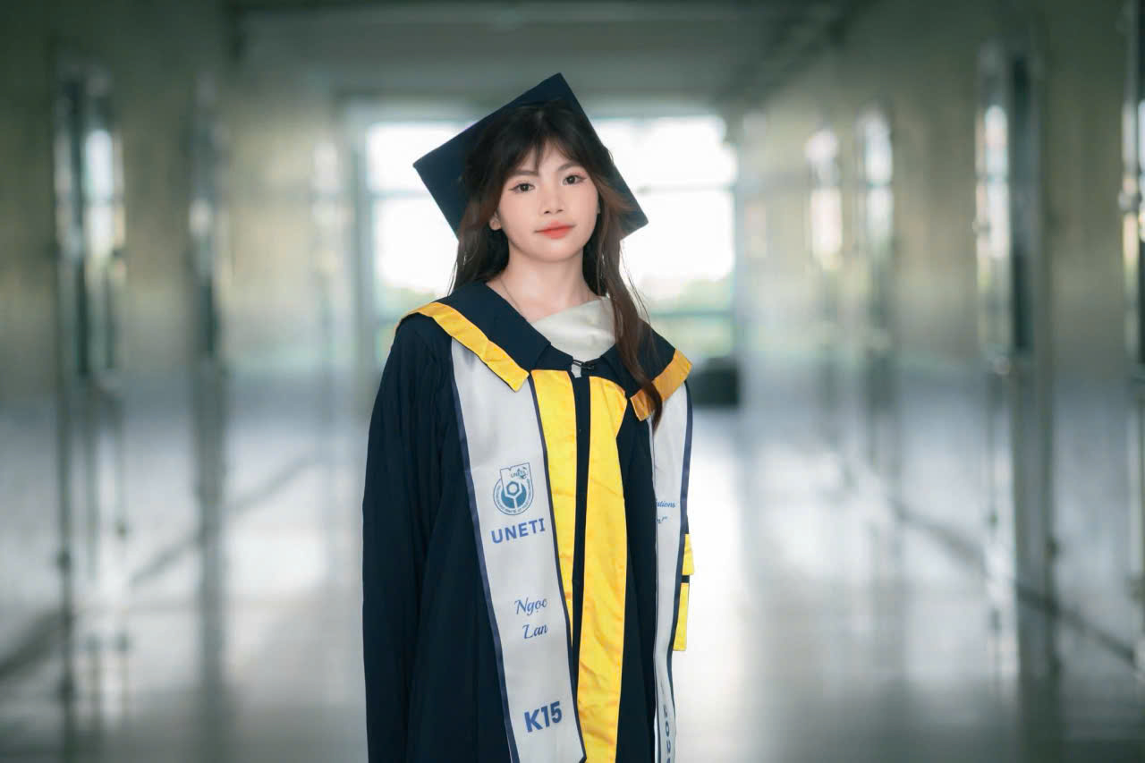 may áo cử nhân UNETI